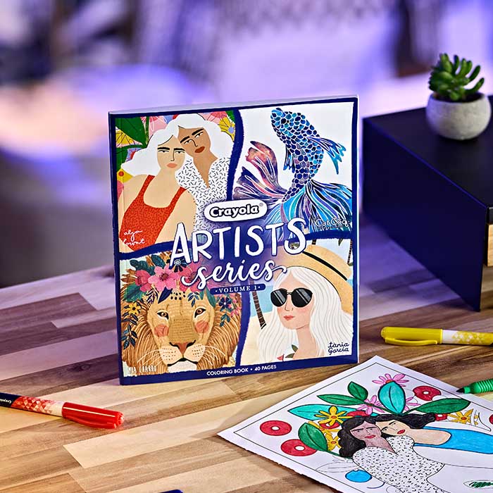 Adult fine line coloring books on a desk