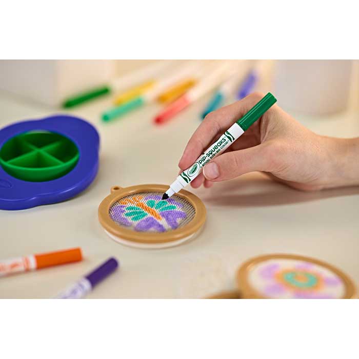 Squish Pix - 3D Art for Kids. Adding the final touches to a finished pix with scattered contents.